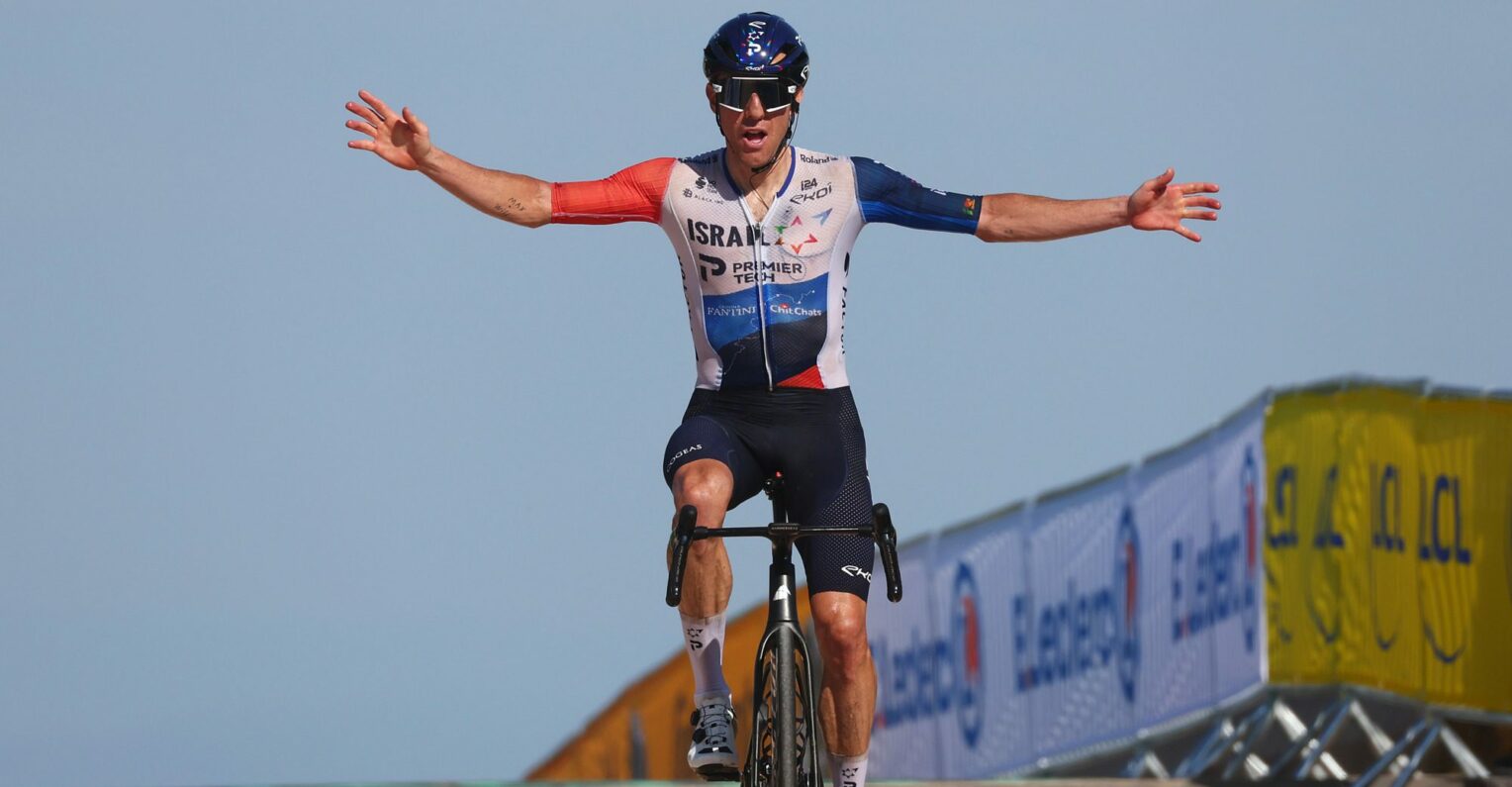 Michael Woods celebrates soloing to win at Puy de Dôme